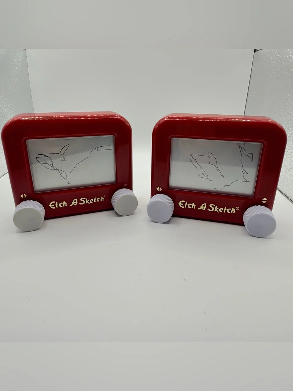 Pair of Mini Classic Red etch a Sketch toys
